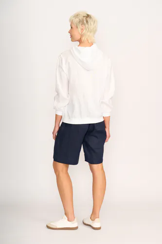 Model wearing White Jacket - Relaxed, Zip Front By Preen Available at Beetees Nelson